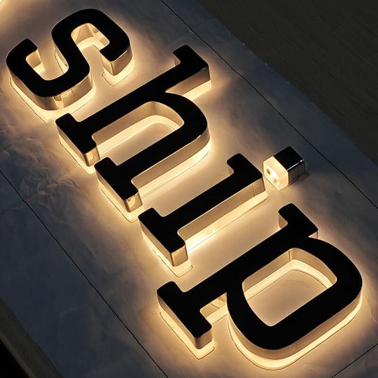 Custom backlit artwork signs for offices and commercial interiors